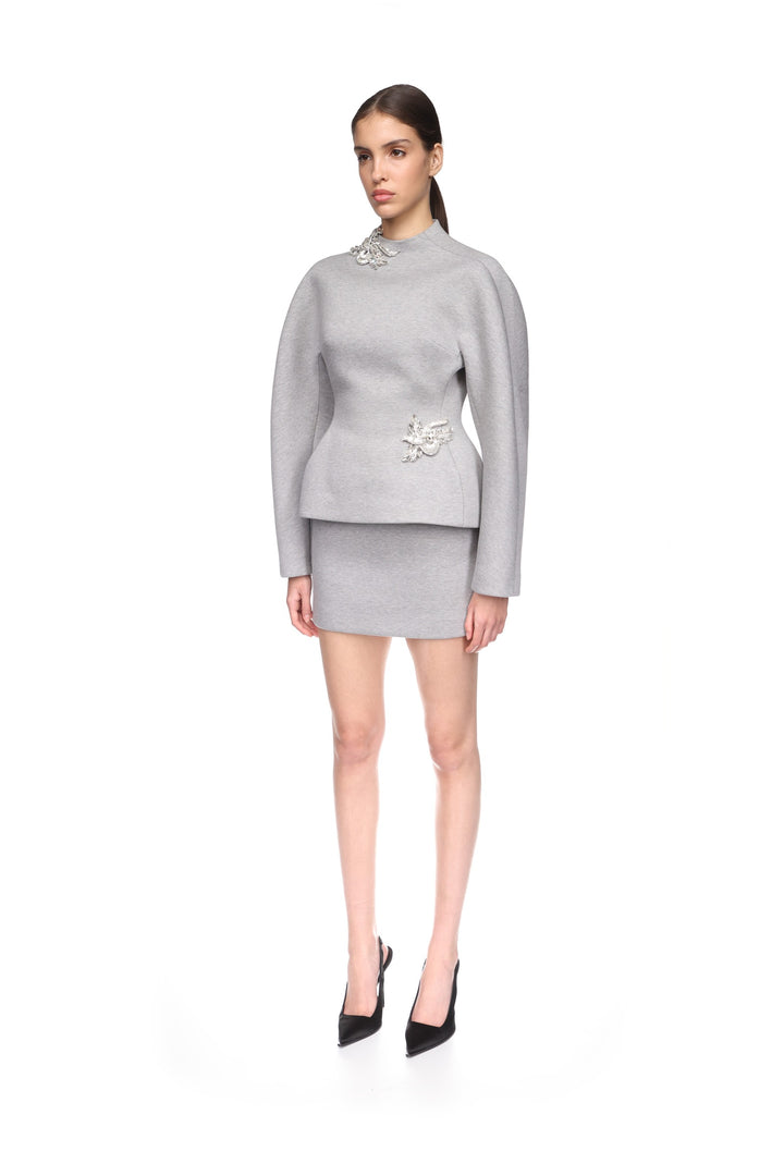 CRYSTAL BROOCH DETAIL PEPLUM TOP