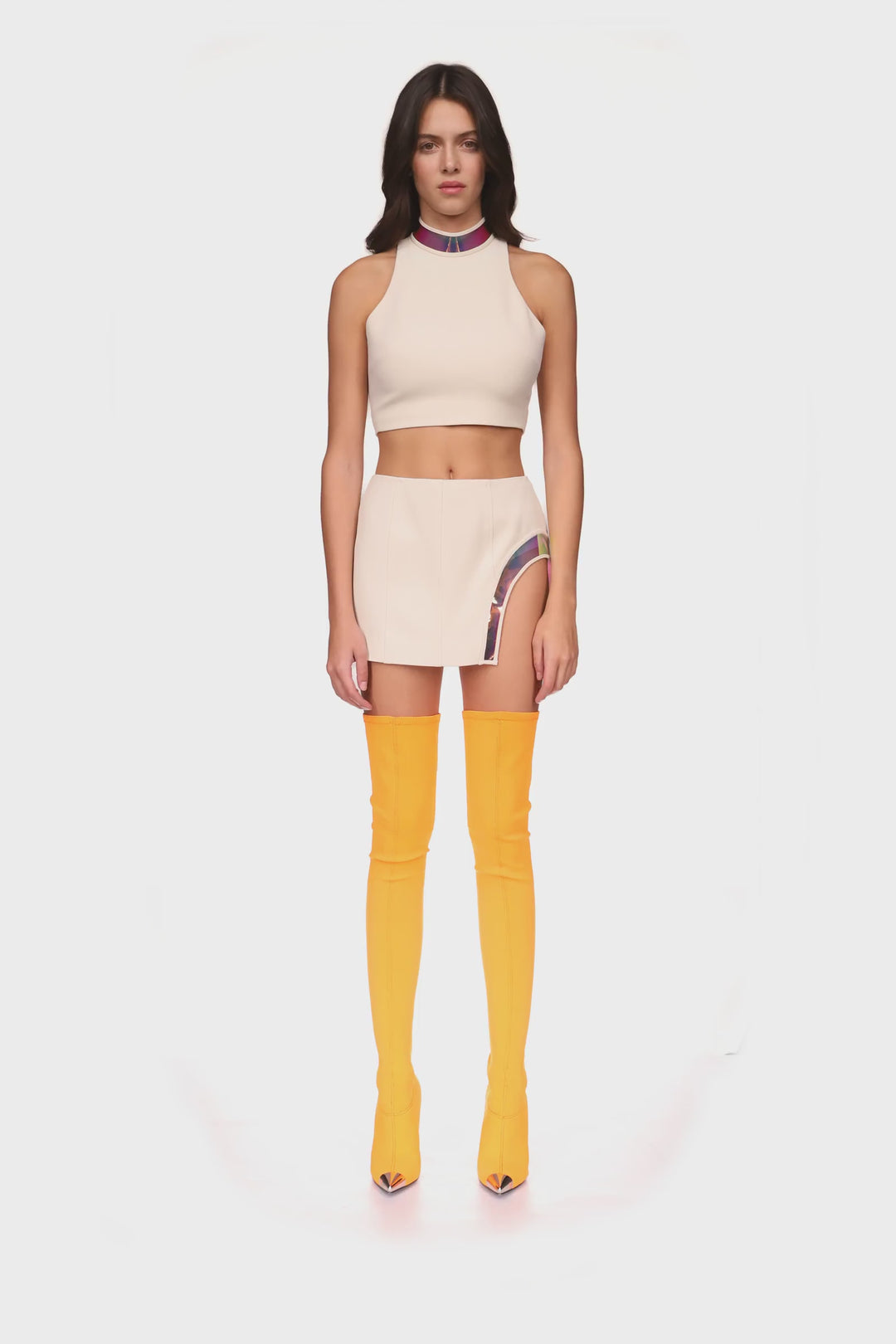 IRIDESCENT PVC LEG CUTOUT MINI SKIRT