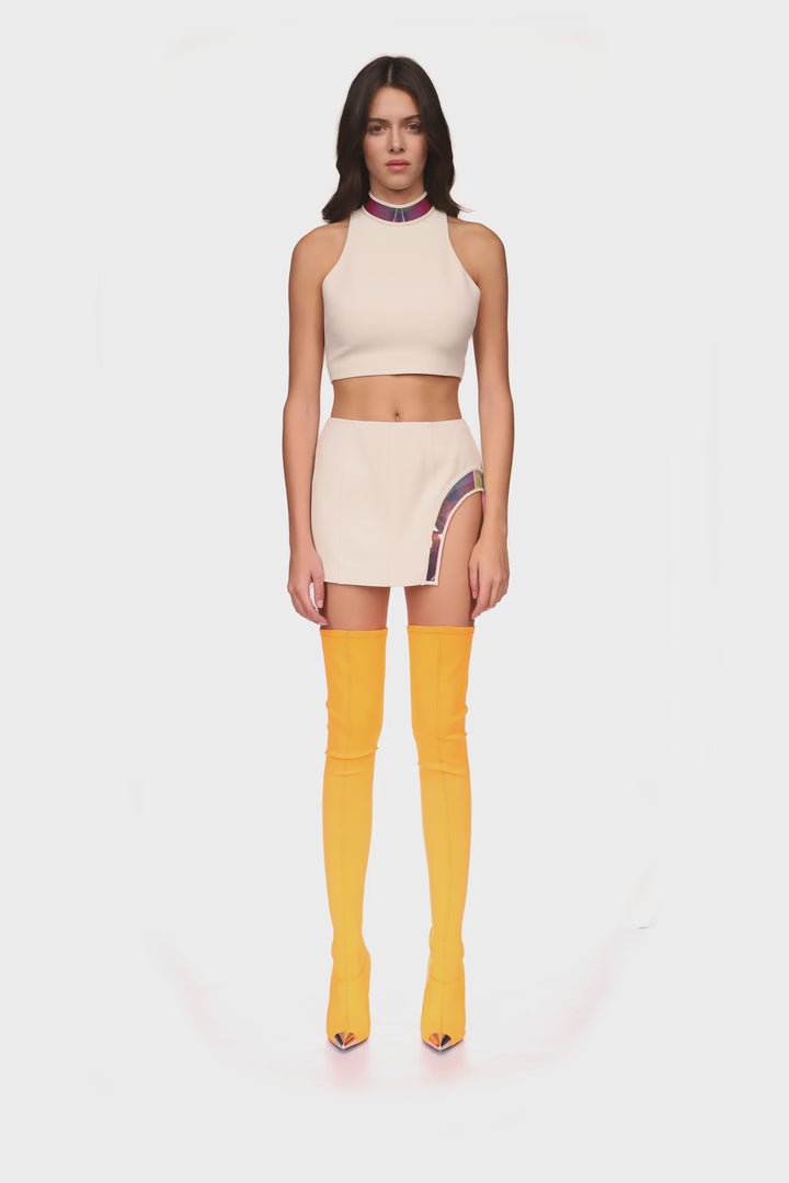 IRIDESCENT PVC LEG CUTOUT MINI SKIRT